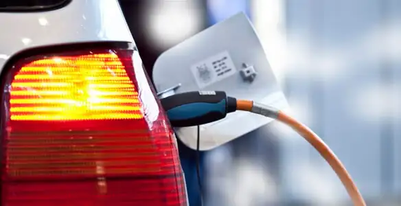 Electric car plugged into EV charger after professional installation in Boise, ID