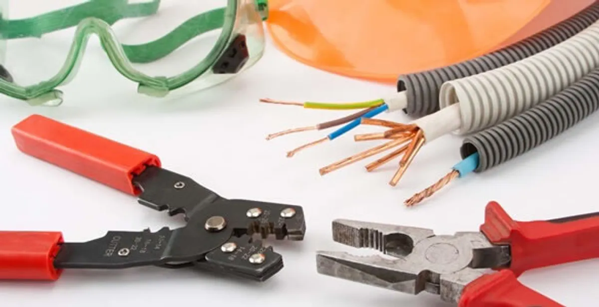Electrical wiring repair with professional tools and safety equipment in Garden City, ID