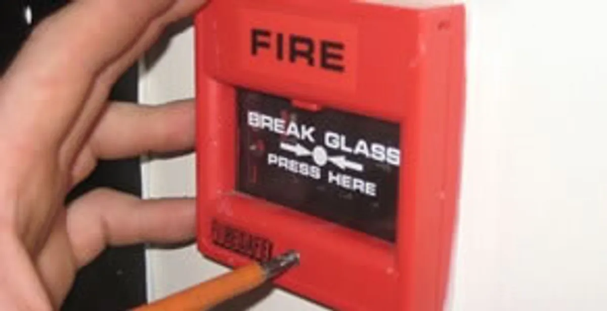 fire alarm installation service showing manual fire alarm pull station installed by licensed electricians in Boise, ID