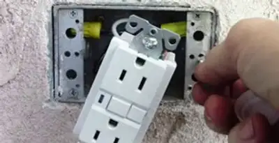 gfci circuits service showing installation of a ground fault circuit interrupter outlet by licensed electricians in Boise, ID