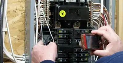 Home electrical inspection of circuit breaker panel by licensed electrician in Boise, ID