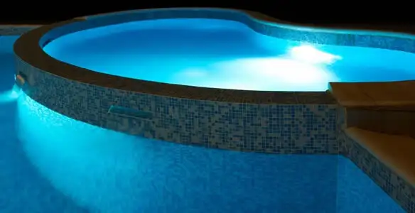 pool light installation and repair services highlighting illuminated pool interior lighting in Boise, ID