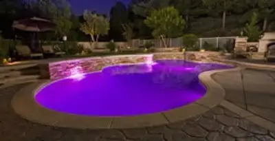 pool light installation and repair services illuminating a residential swimming pool in Boise, ID