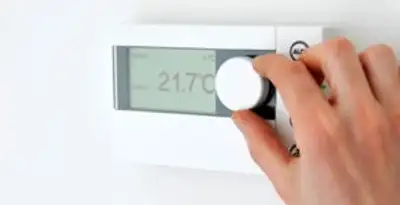Thermostat installation service with professional adjusting temperature control in Boise, ID